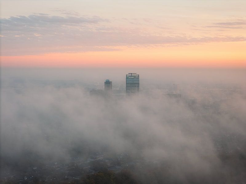 Ijssel tower in the mist, with sunrise by Thomas Bartelds