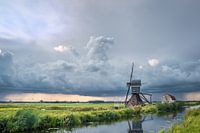 Windmill under a stormy sky