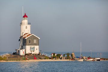 Lighthouse of the island of Marken in the evening light - Netherlands by Servan Ott