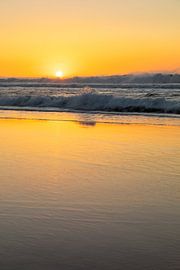 Waves on the beach at sunset by Markus Lange