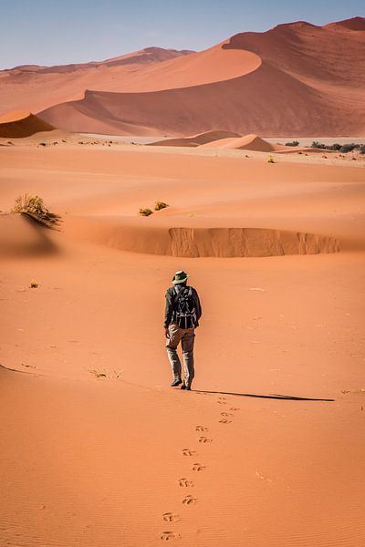 Footsteps in the sand dunes of Sossusvlei, Namibia by Opmeer Reports