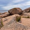 Baltic Sea coast with rocks and ship on the island of Blå Jungfrun i by Rico Ködder