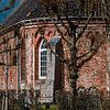 Seitenwand der kleinen Kirche von Swichum-Friesland von Harrie Muis