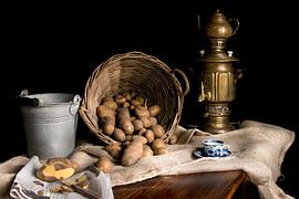Still life with brass samovar and basket with potatoes by Marianne van der Zee