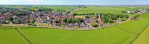 Luchtfoto panorama van het historische plaatsje Holwerd bij de Wadden Sea in Friesland Nederland
