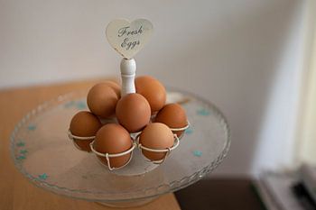 Fresh eggs on a decorative dish