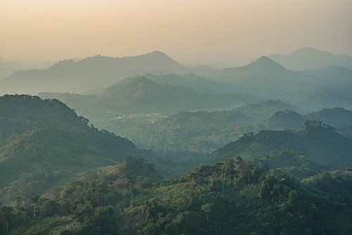 A sunset over Ivory Coast's green hills
