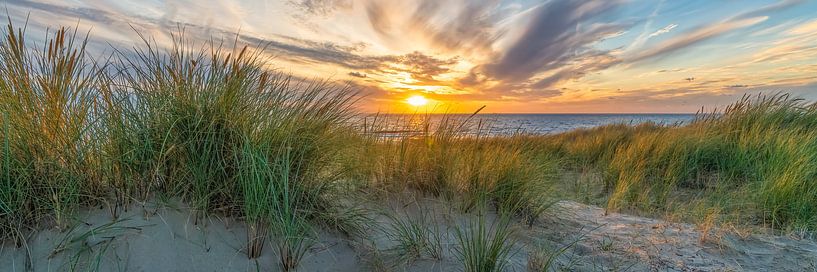 sunset on the dunes and the North Sea by eric van der eijk
