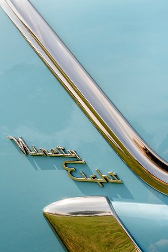 Vintage Design. A classic car in colour.