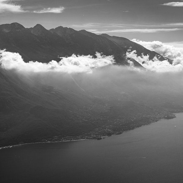 Mount Monte Baldo and town Malchesine on Lake Garda in black and white from Punta Larici by Daniel Pahmeier