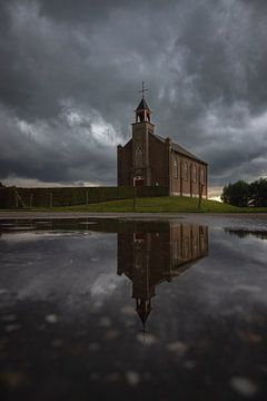 Storm Boven Vluchtheuvelkerk, Homoet van Rudolfo Dalamicio