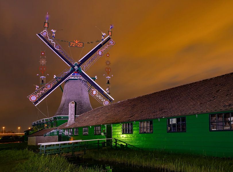 Paper producing windmill called De Schoolmeester with decorated wings by Rene van der Meer