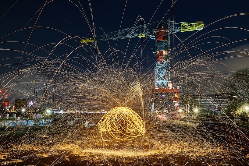 Flaming steel wool slinging at the NDSM yard in Amsterdam by Ad Jekel