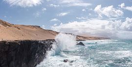 Splashing wave against a rocky coast, La Pared, Fuerteventura, Canary Islands, Spain by Rene van der Meer