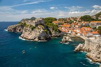 Dubrovnik - fortress with city wall above small bay.
