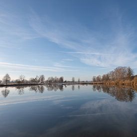 Clouds are reflected in the water by Ulrike Leone