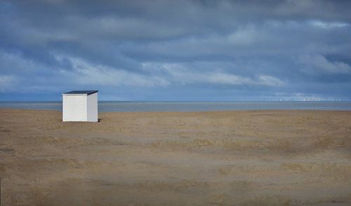White cabin at the beach
