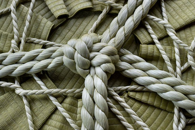 Traditional Japanese knotted rope around a rice wine barrel by Frans Rombout