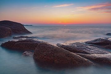 Sunset at the pink granite coast in Brittany, France by Sjoerd van der Wal