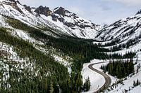 A road through the snowy mountains