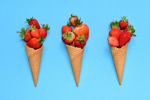 Three croissants with strawberries