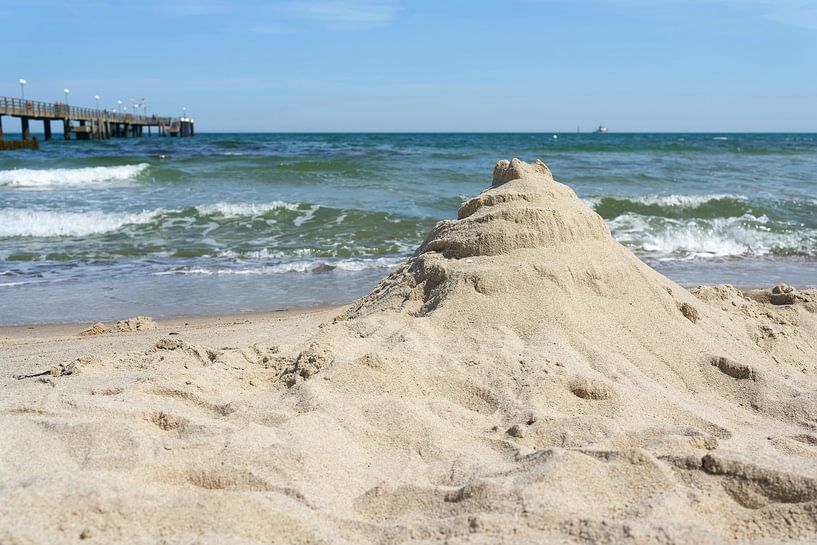 Sandcastle on the beach by Heiko Kueverling