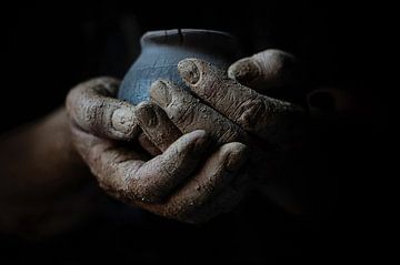 Hands in clay