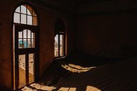 The windows of a ruin in ghost town Kolmanskop