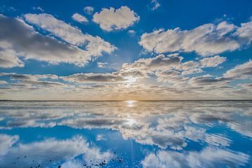 Zonsondergang op het Wad vanaf de pier van Paesens Moddergat