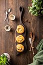 Tasty breakfast with coffee rolls and coffee by Iryna Melnyk thumbnail