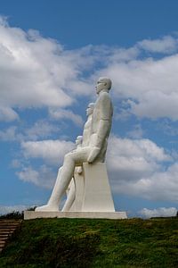 White Men statues, Esbjerg, Denmark. Four white men sitting looking at the sea near Esbjerg
