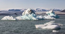 Floating icebergs in Jokulsarlon glacier lagoon, Iceland by PhotoCluster