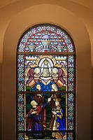 Stained glass window of church building