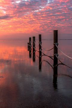 zonsopkomst aan de waddenzee sur Frans Bruijn