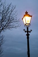 Golden lantern during the blue hour