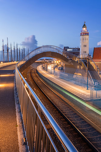 Harlingen lighthouse and the streaks left by a passing train