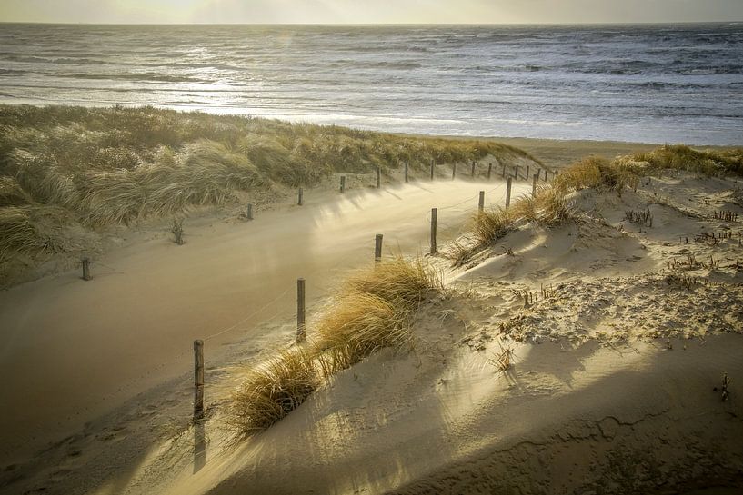 Beach, sea and sun on a stormy evening! by Dirk van Egmond