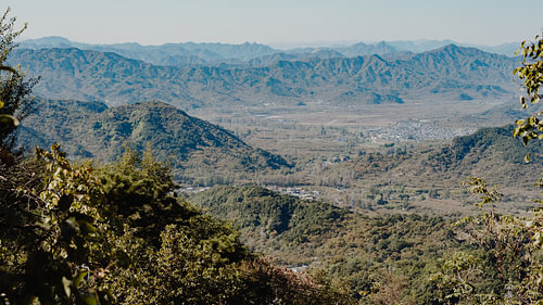 A sweeping view across a Chinese mountain valley