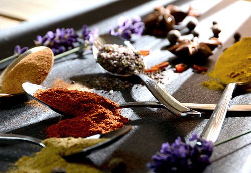 Spices on spoon by Alex Neumayer