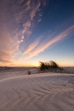 Colourful sunset on the beach of Zeeland by Peter Haastrecht, van