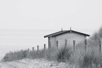 Het huisje bij de strandopgang.