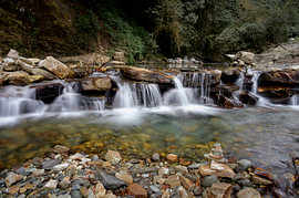A small waterfall in the Nepalese mountains by Laimute Kuriene