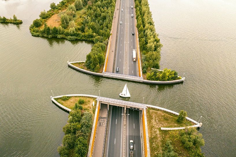 Aquaduct Veluwemeer in the Veluwe lake with a boat sailing in th by Sjoerd van der Wal Photography