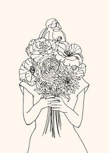Femme avec un bouquet de fleurs