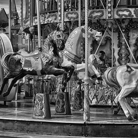 Antique carousel with horses by Iris Heuer