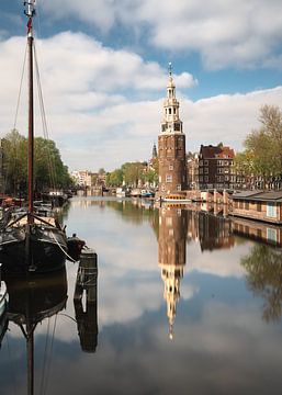 Montelbaan tower, canal and old houses in Amsterdam, the Netherlands. by Lorena Cirstea