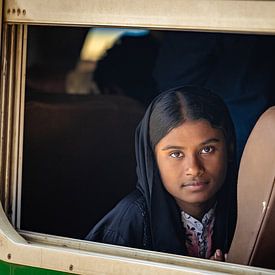 Girl looks out the window by Steven World Traveller