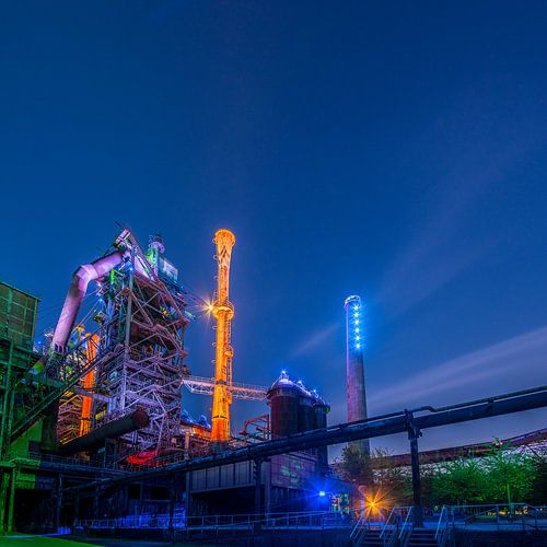 Illuminated factory in the evening
