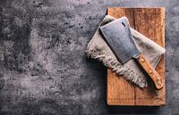 12477960 Vintage butcher's knife on rustic background by BeeldigBeeld Food & Lifestyle thumbnail