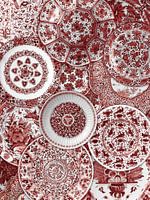 Collection of Delft blue plates from the Rijksmuseum Amsterdam. Here in red colourway
